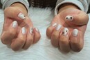 ハンド 定額デザイン「パールホワイトのベースにゴールドのハートをポイントで！」|Nail Salon Linda